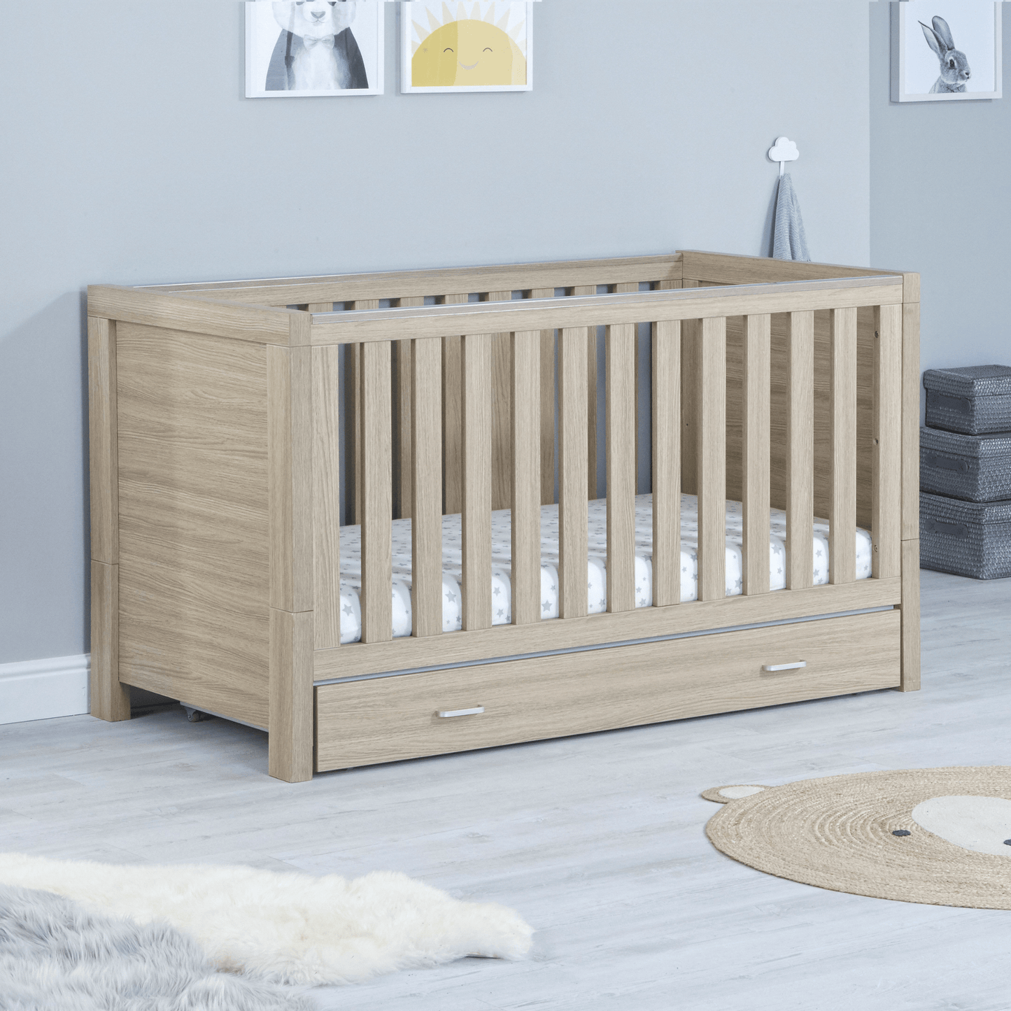 Luno-3-piece-nursery-set-with-drawer-on-cot-oak-showing-cotbed-only