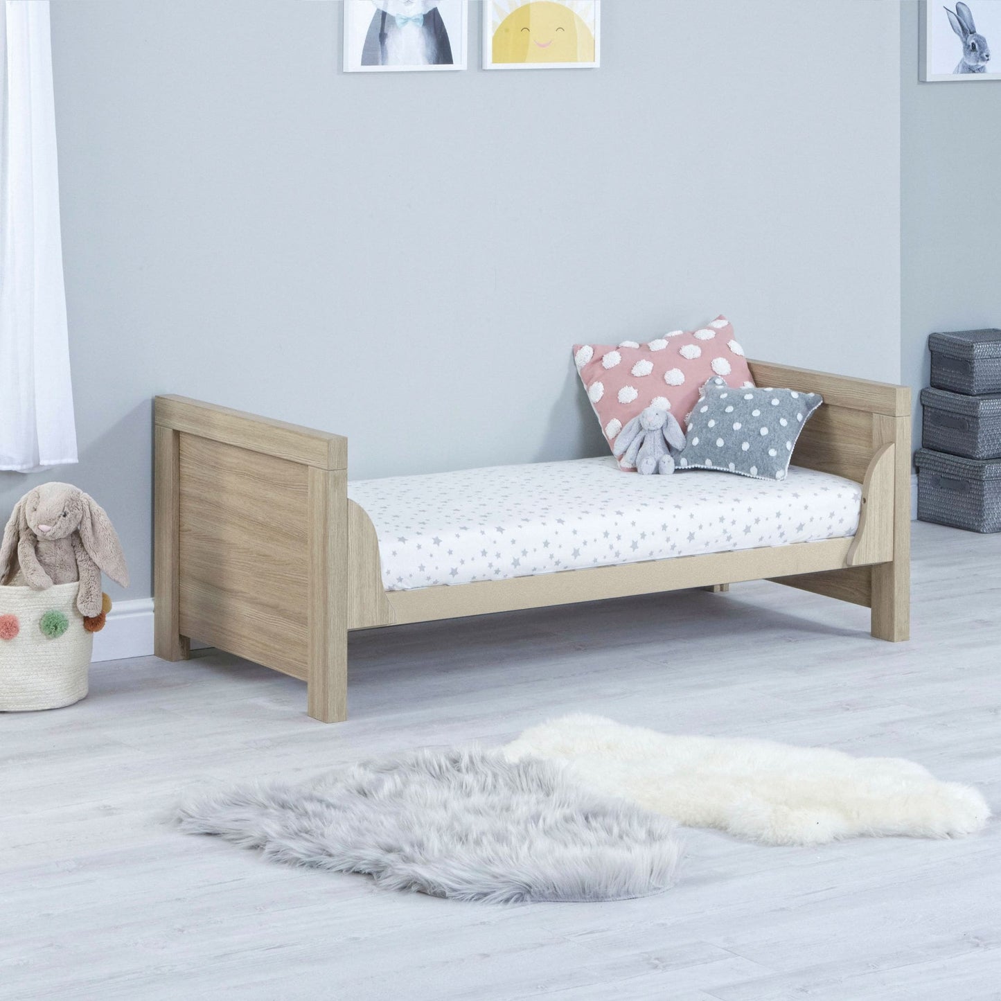 Babymore-Luno-Cot-Bed-oak-in-nursery-setting-as-cot-bed-side