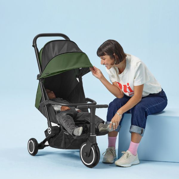 smarTrike-Stroller-reclined-baby-asleep-hood-down-with-adult-forest-green