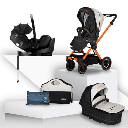 White and black baby stroller, with orange detailing, carrycot, pushchair car seat, and accessories on a white background