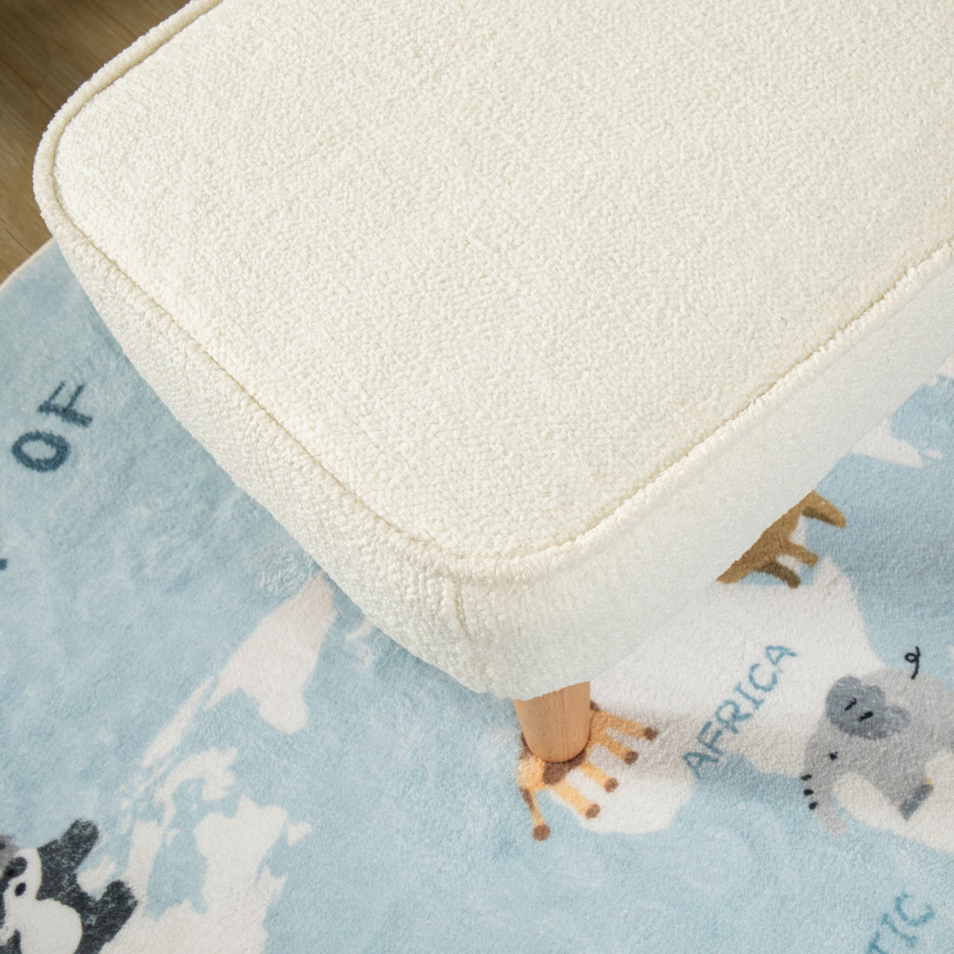 Ida-Nursing-Chair-stool-boucle-close-up-fabric-white
