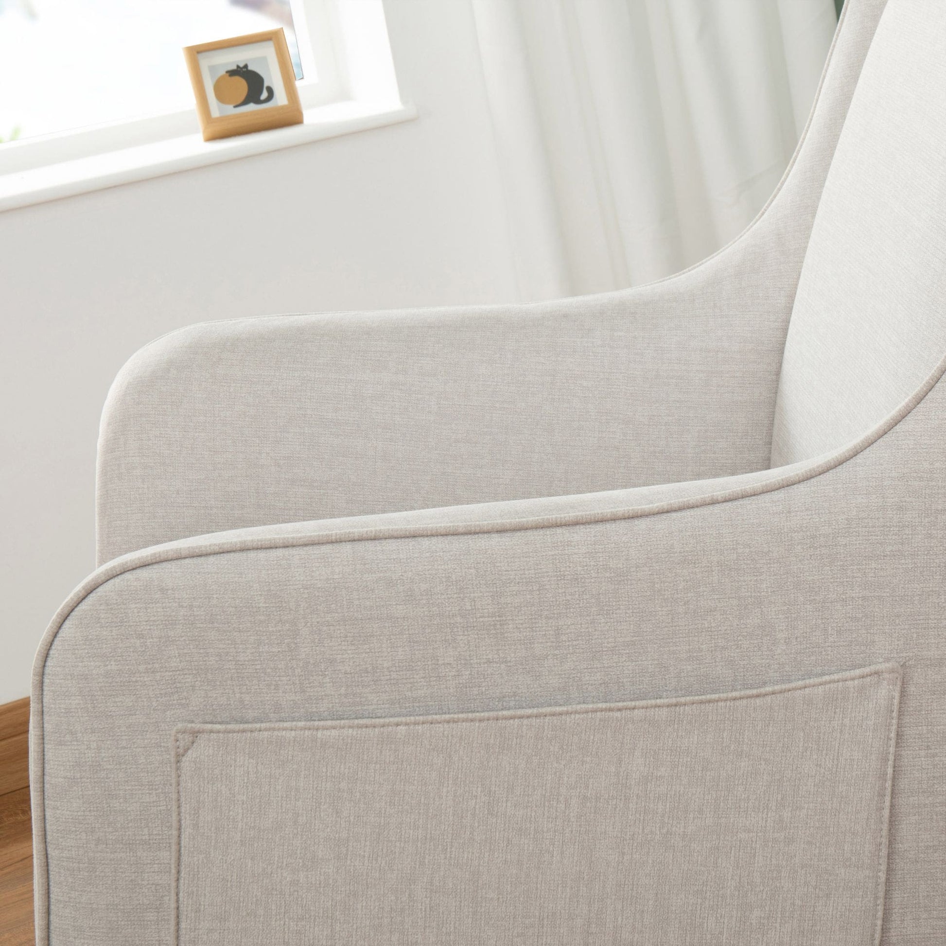 Ida-Nursing-Chair-close-up-arms-and-pocket-white-side