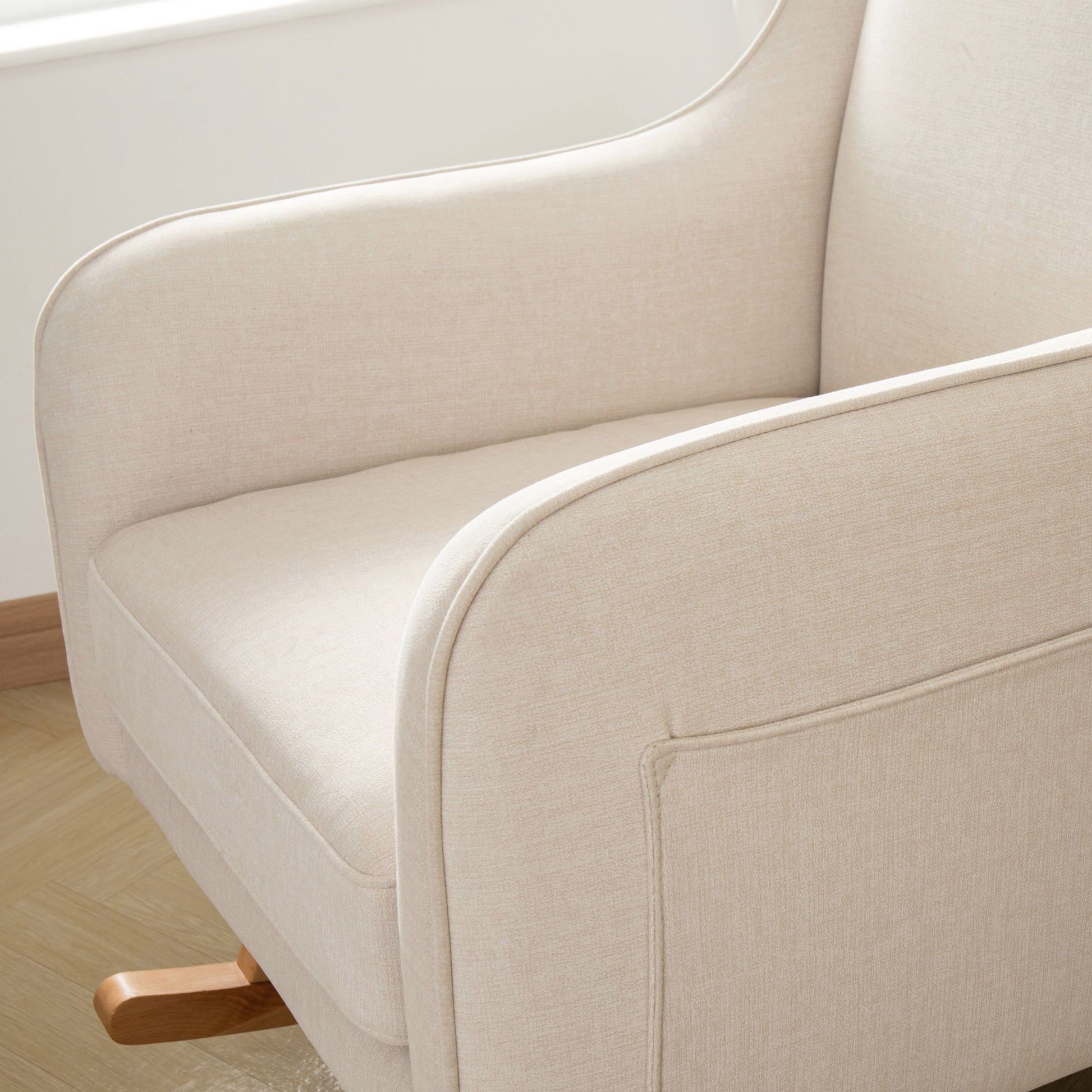 Ida-Nursing-Chair-close-up-arms-seat-pocket-ivory-white-side