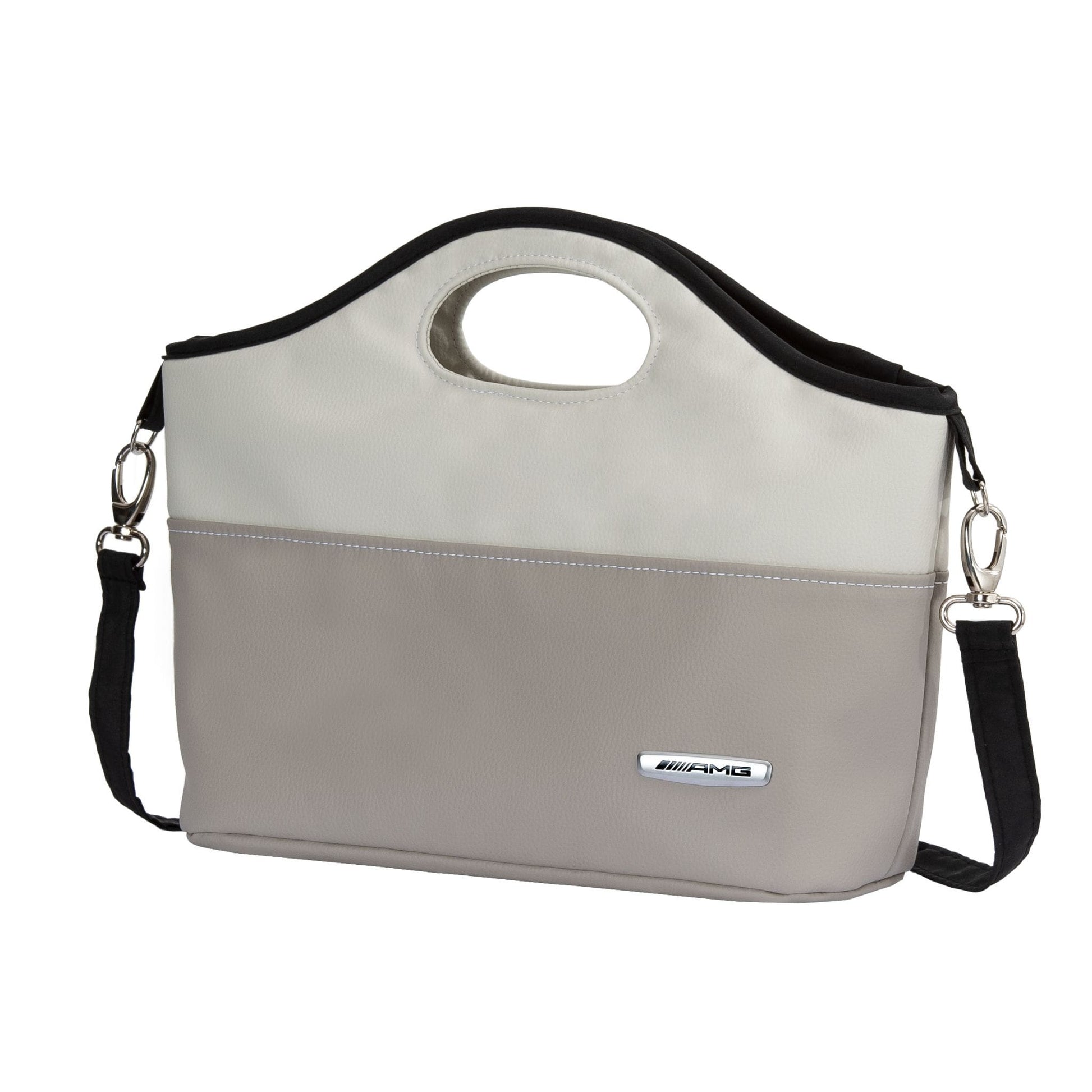 Gray and beige handbag with a black strap on a white background