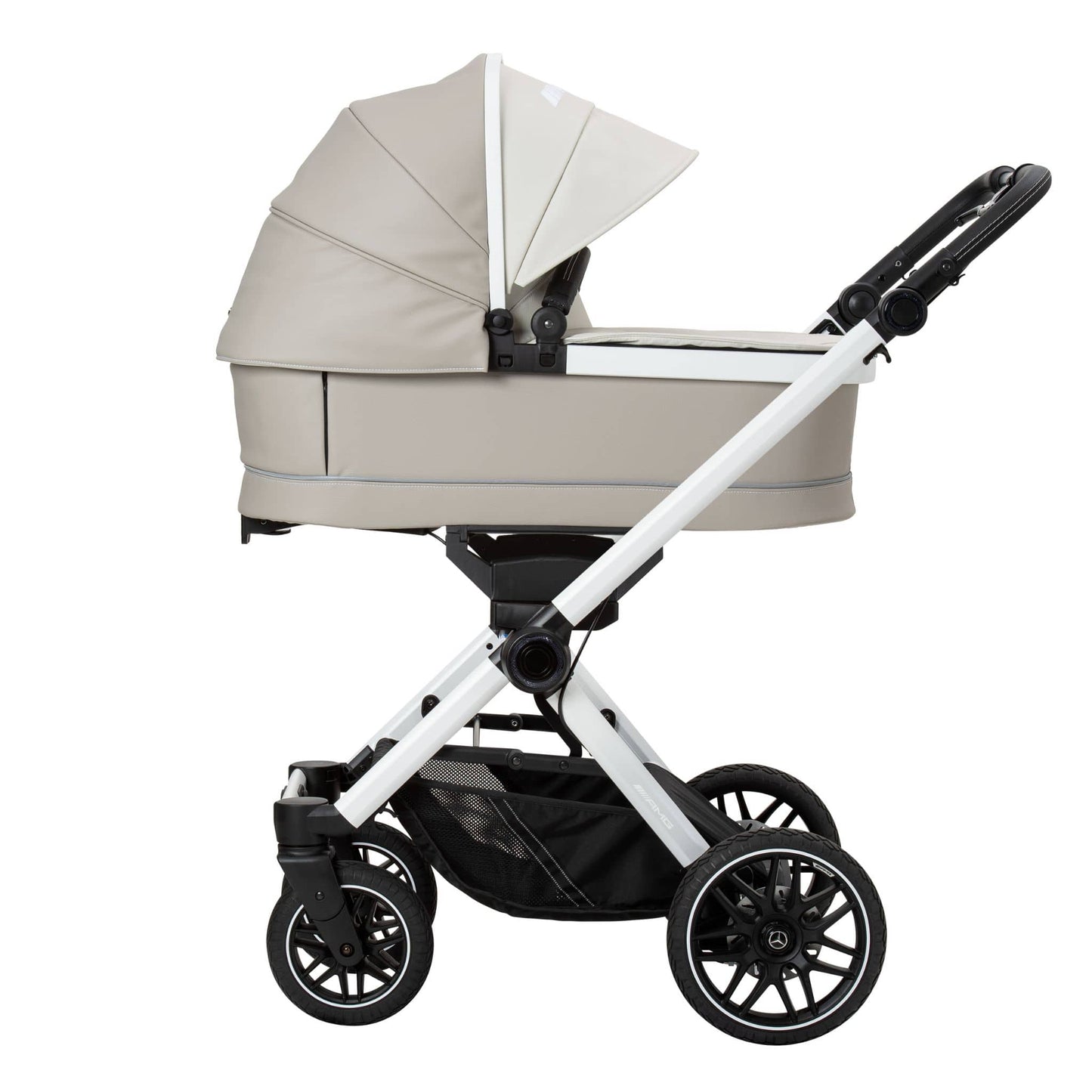 Beige and white baby pram on a white background