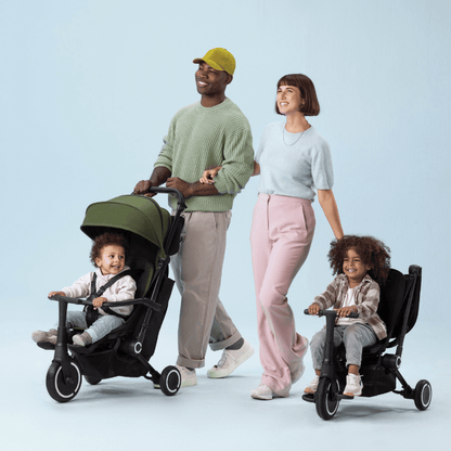 smarTrike-Stroller-forest-green-child-facing-forward-pushed-by parent-plus-toddler-trike-child-steering-themselves