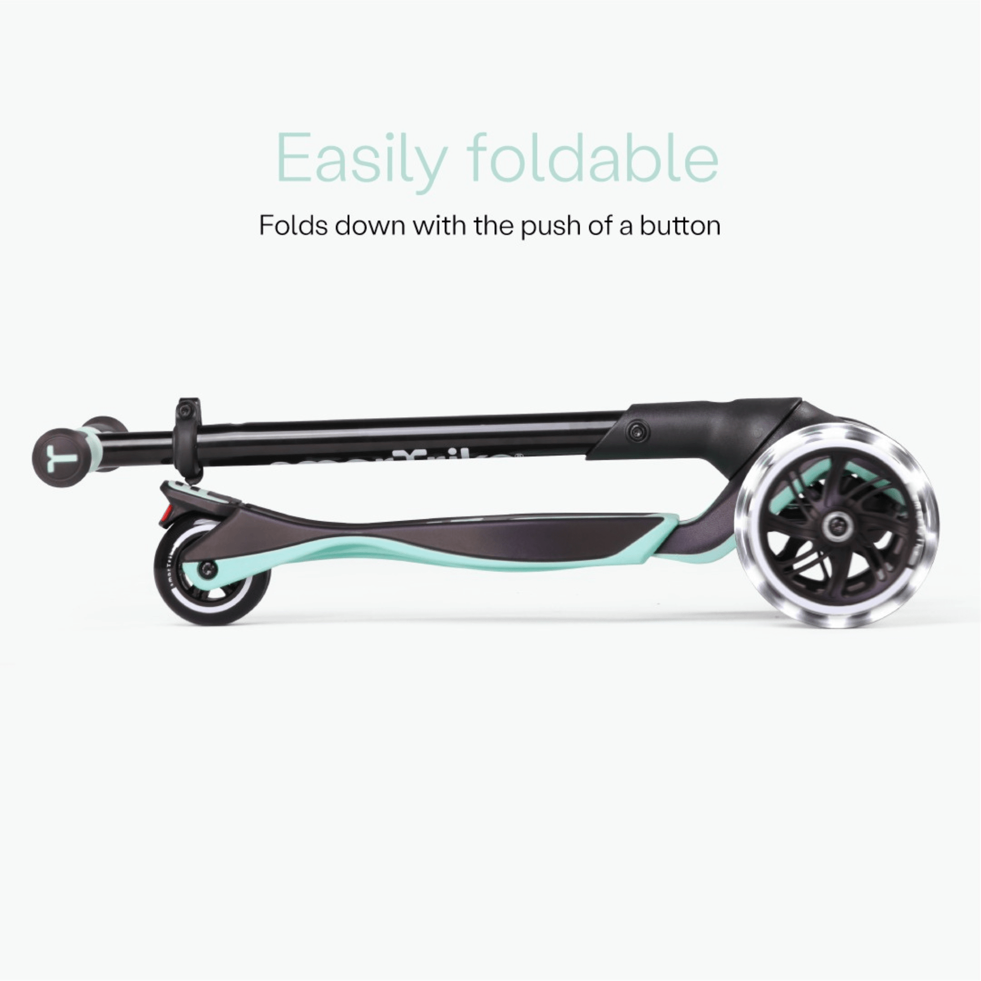 smarTrike-Xtend-ride-on-Scooter-folded-in-two-green