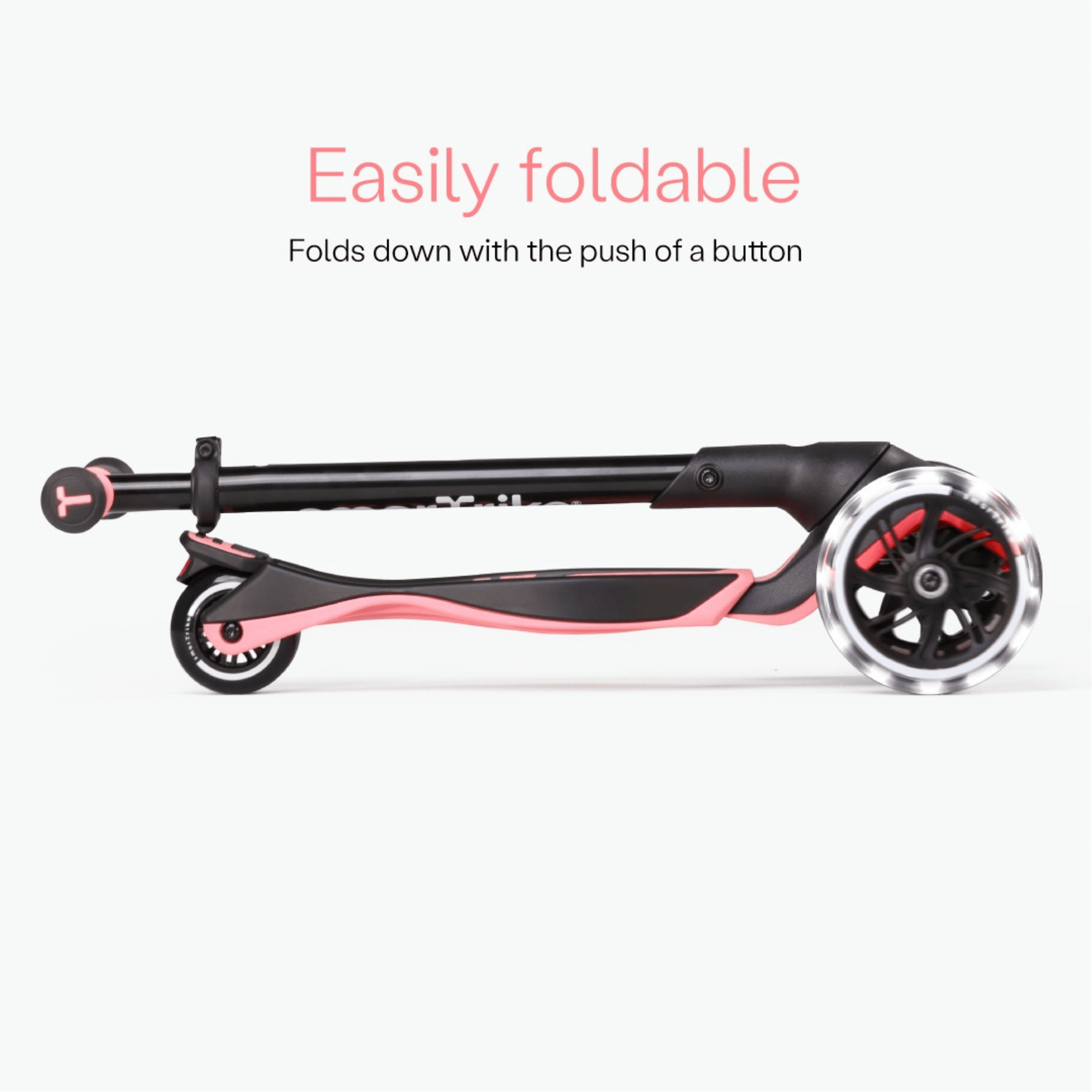 smarTrike-Xtend-ride-on-Scooter-folded-in-two-pink